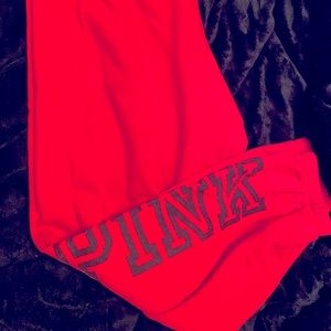 Red Victoria’s Secret sweatpants